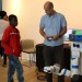 Mark Moll talking with a middle school student about Igor, the robot